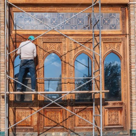 male-worker-restores-ancient-carved-wooden-door-hazrati-imam-mosque-uzbekistan-tashkent_118086-22549